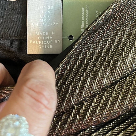 Skirt in shimmering metallic bronze with a glittery, stiff waistband. Size 6 - Picture 4 of 4